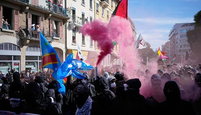 Manifestantes e pol&iacute;cia confrontam-se em Genebra antes da cimeira do G7